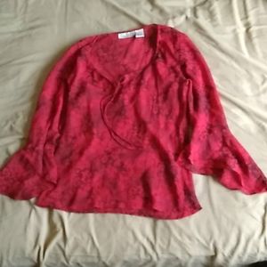 Red bell sleeved top